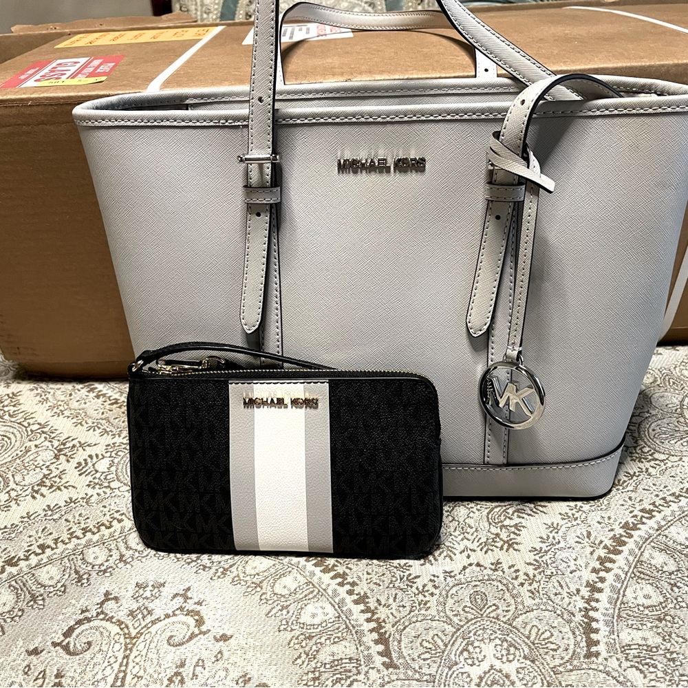 MK Bag and wristlet. Bag carried 3 times, wristlet new with tags.